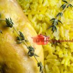 Râble de lapin au riz et au safran avec branche de romarin